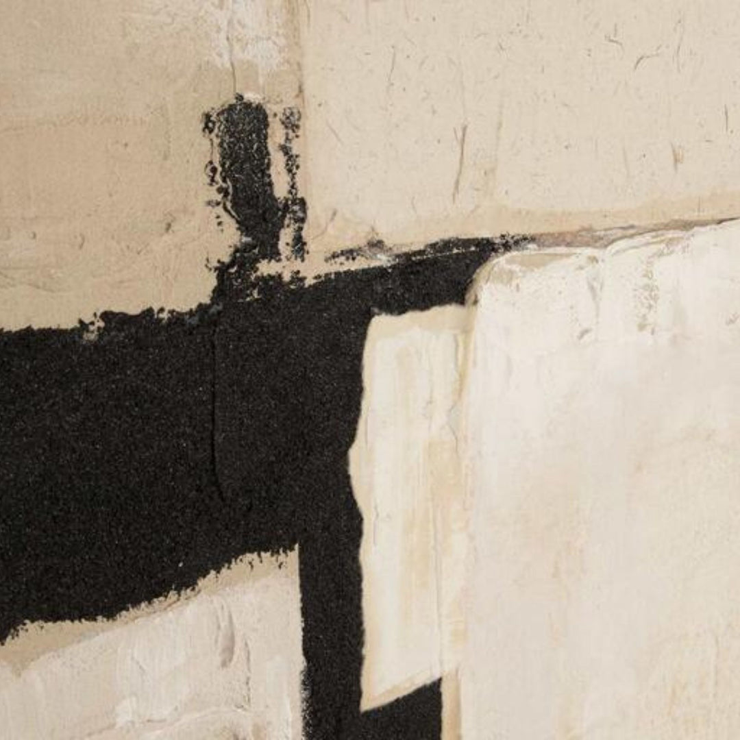 Close-up detail of the black and neutral painted texture in the abstract composition.