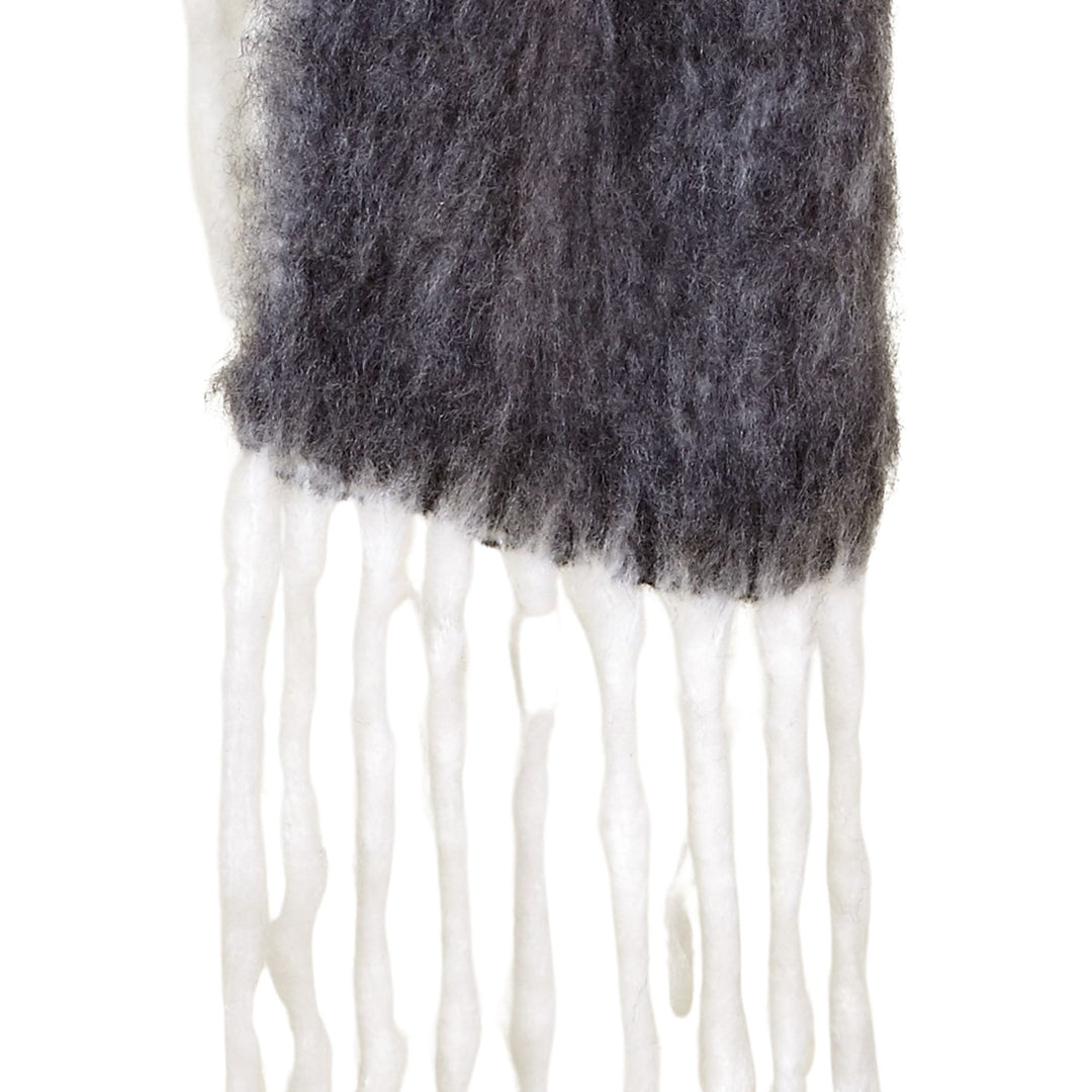 Detail of fringes and fabric texture on Dhara scarf