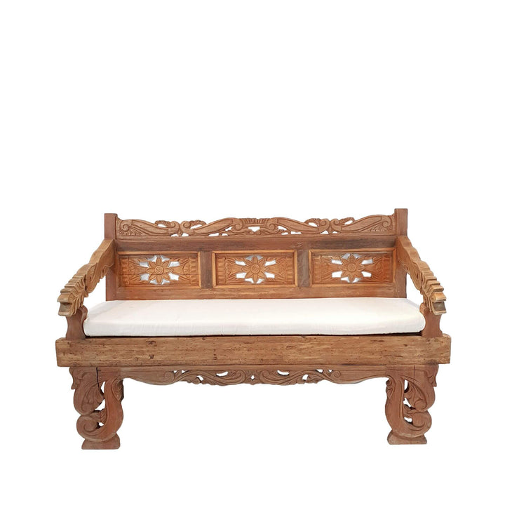 Front view of Diana carved teak wood daybed showcasing its decorative backrest and solid structure.