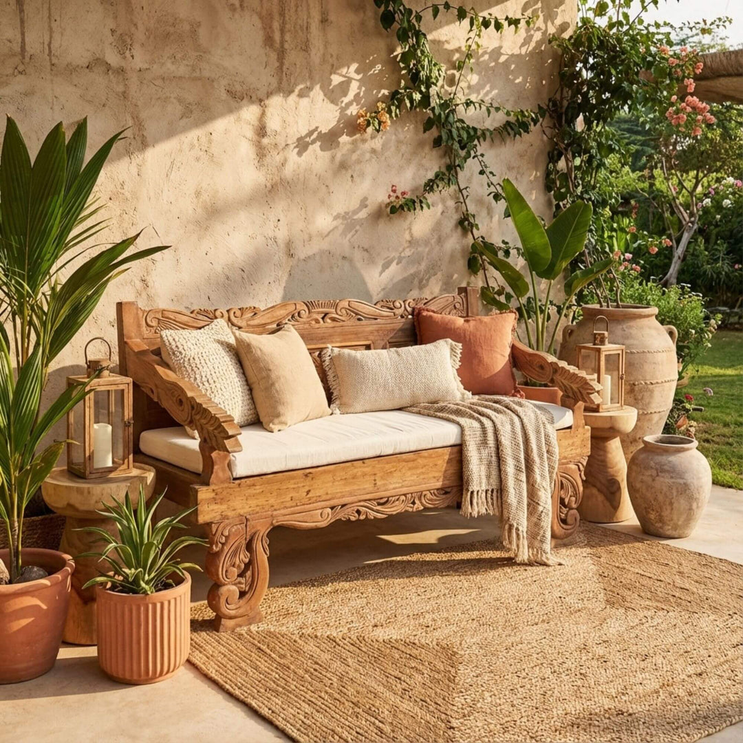 Styled outdoor setting featuring the Diana daybed with cushions and natural décor.