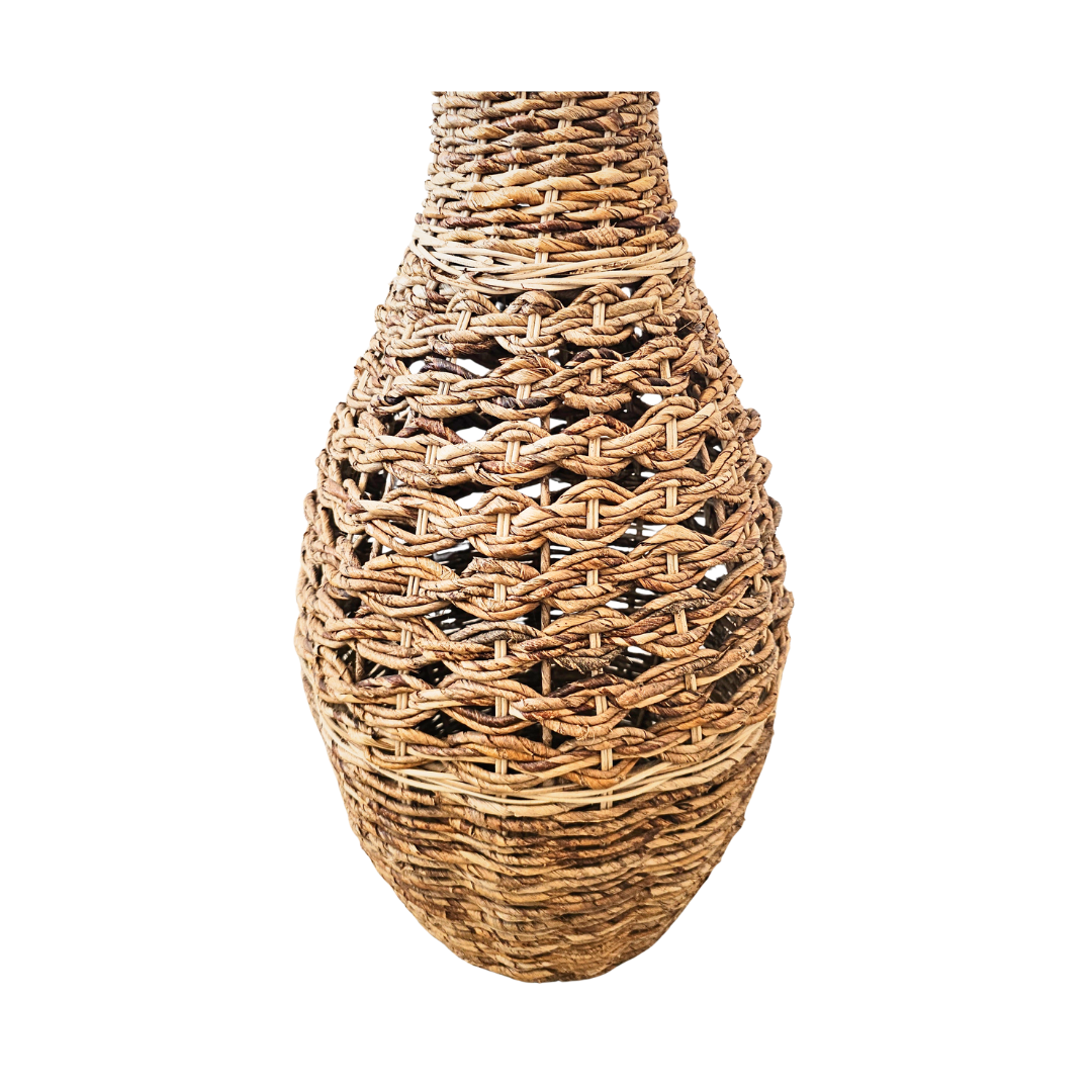 Side profile showing teardrop silhouette of Digue Rattan Basket