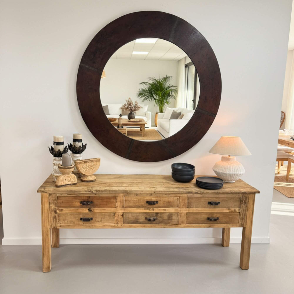 Styled interior scene featuring the Dinka Console Table with decorative accessories.