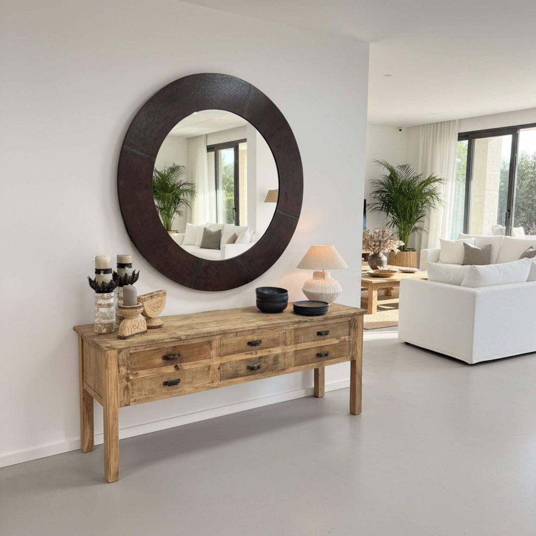 Styled interior scene featuring the Dinka Console Table with decorative accessories.