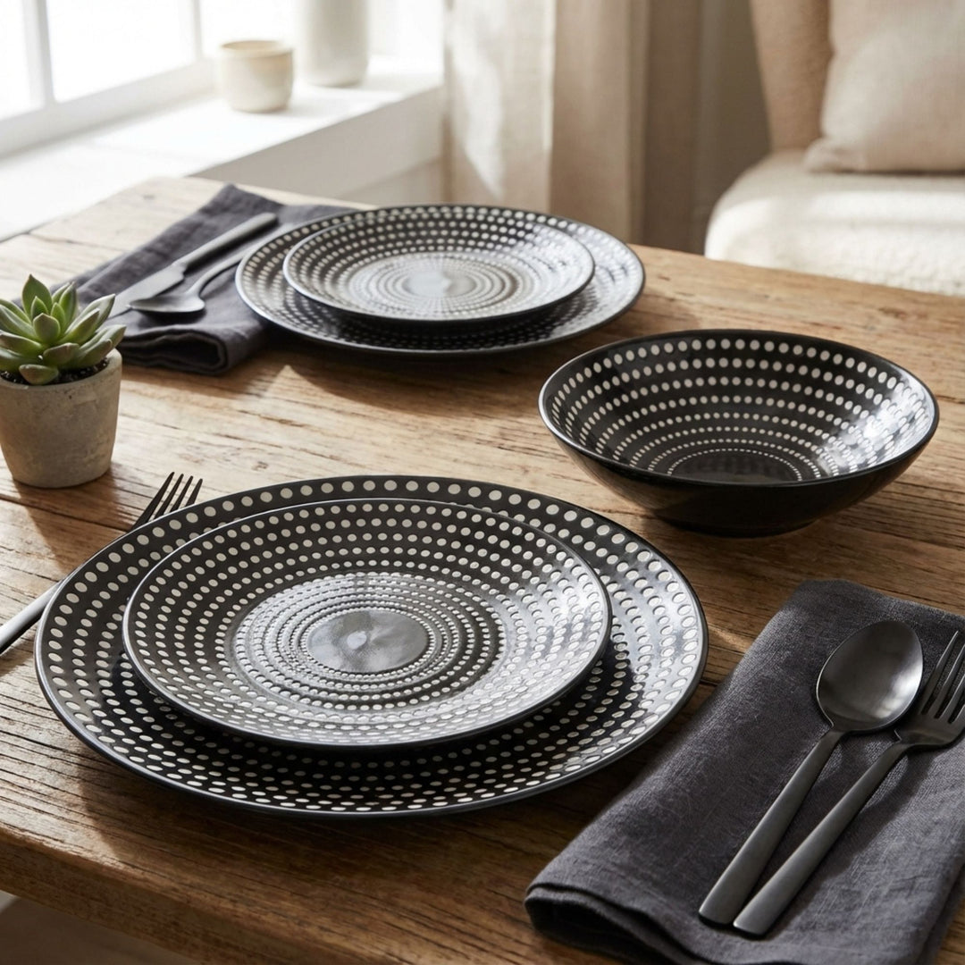 Dots tableware plates and bowls styled on a modern dining table.