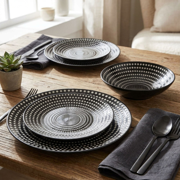 Dots tableware plates and bowls styled on a modern dining table.