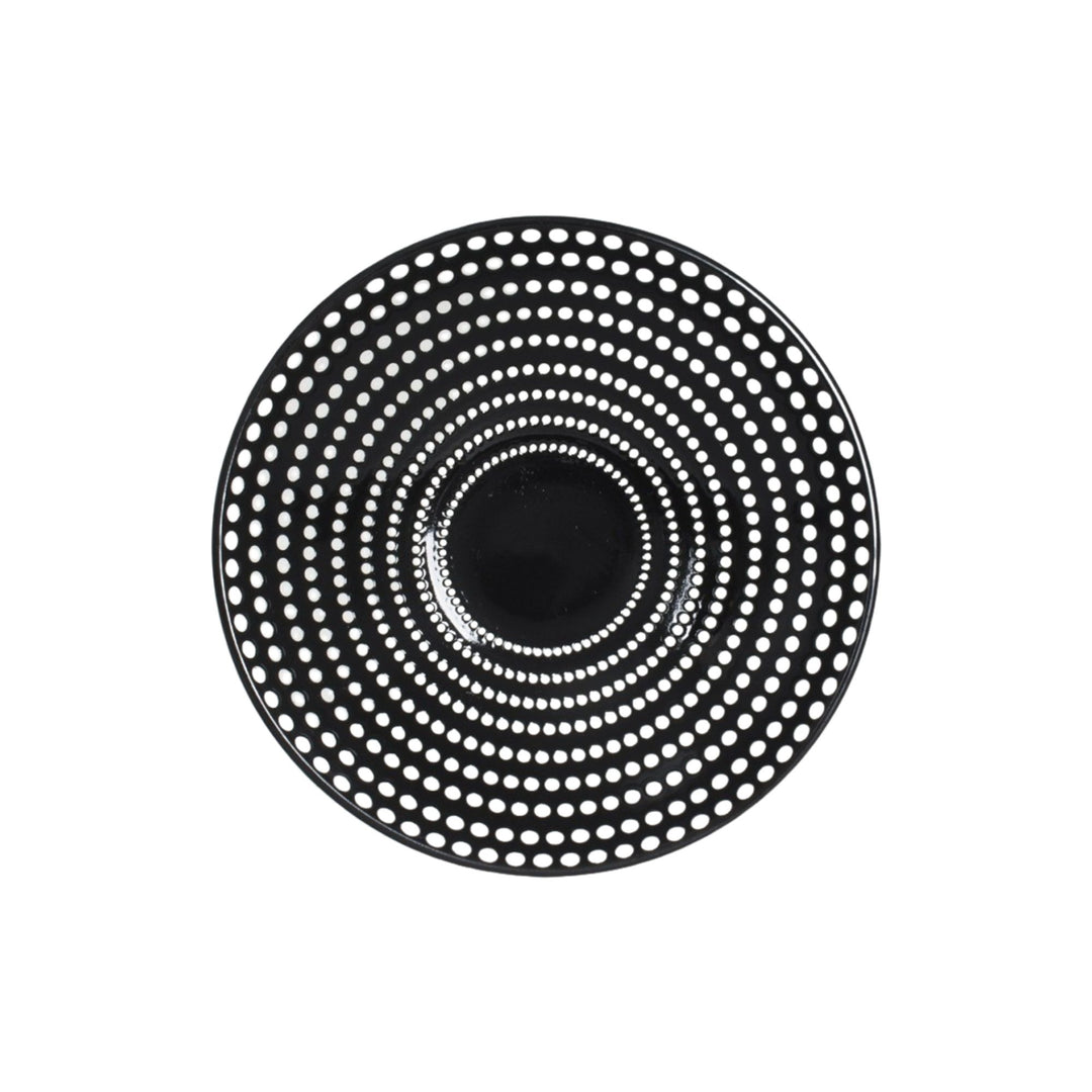 Top view of ceramic bowl highlighting depth and graphic dotted detailing.