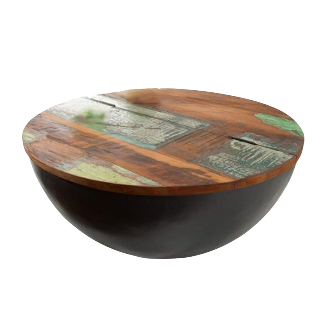 “Drum Coffee Table with black metal base and reclaimed wood top, 70x70x33 cm.”