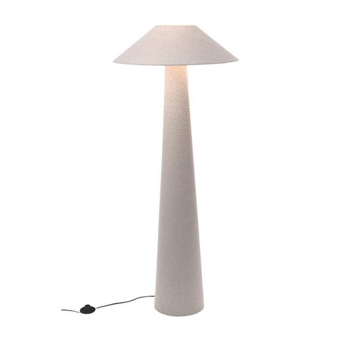 Lit Duna floor lamp with boucle fabric shade and tall conical base