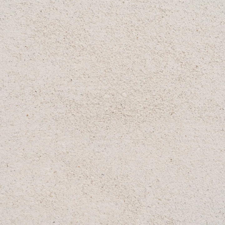 Detail view of Dune Organic Coffee Table edge emphasizing its organic form and handcrafted finish.