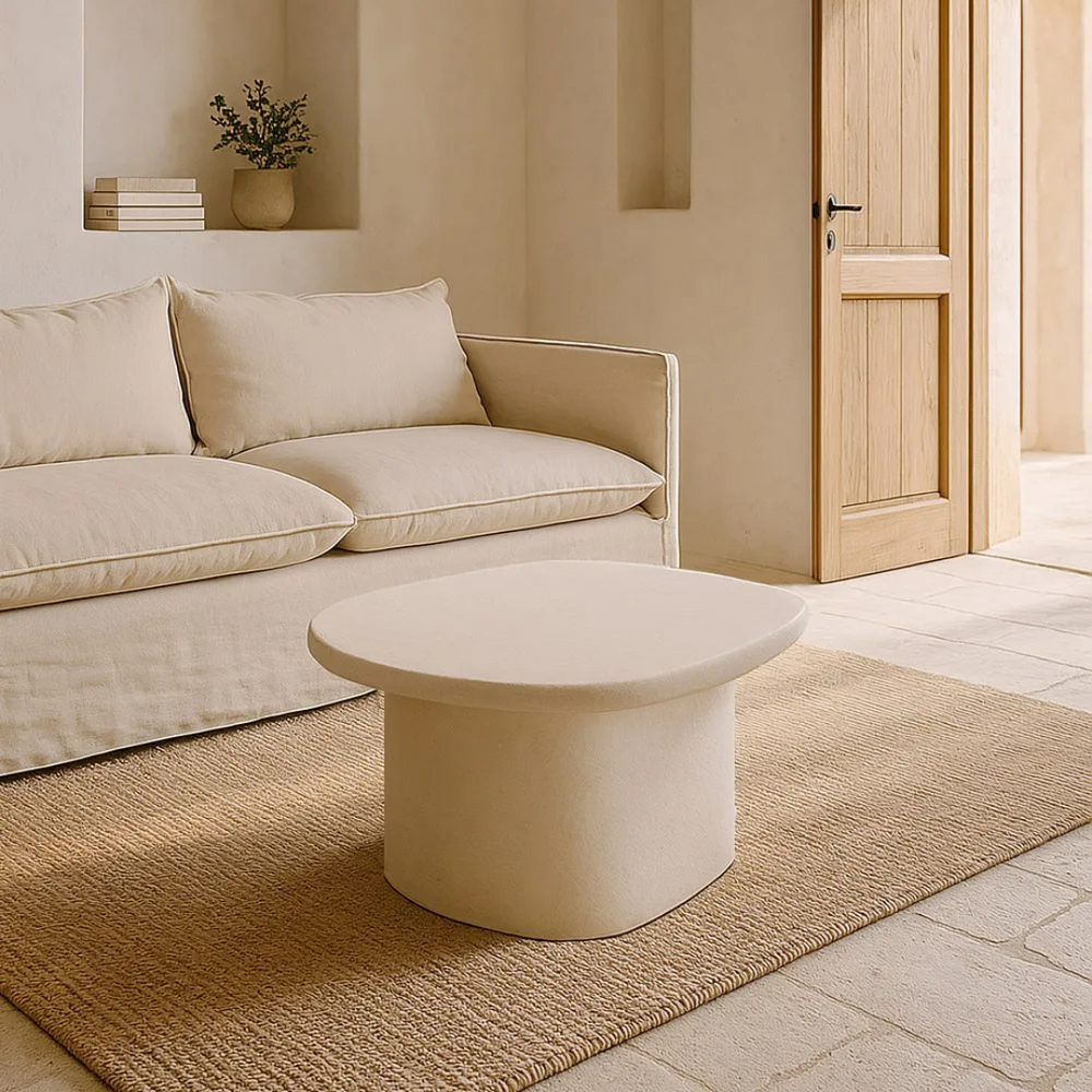 Styled living room setting featuring the Dune coffee table paired with neutral seating.