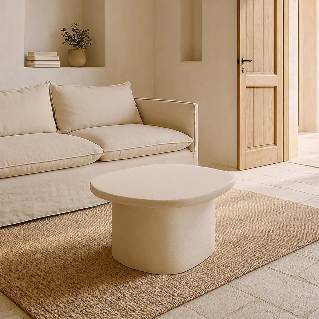 Styled living room setting featuring the Dune coffee table paired with neutral seating.