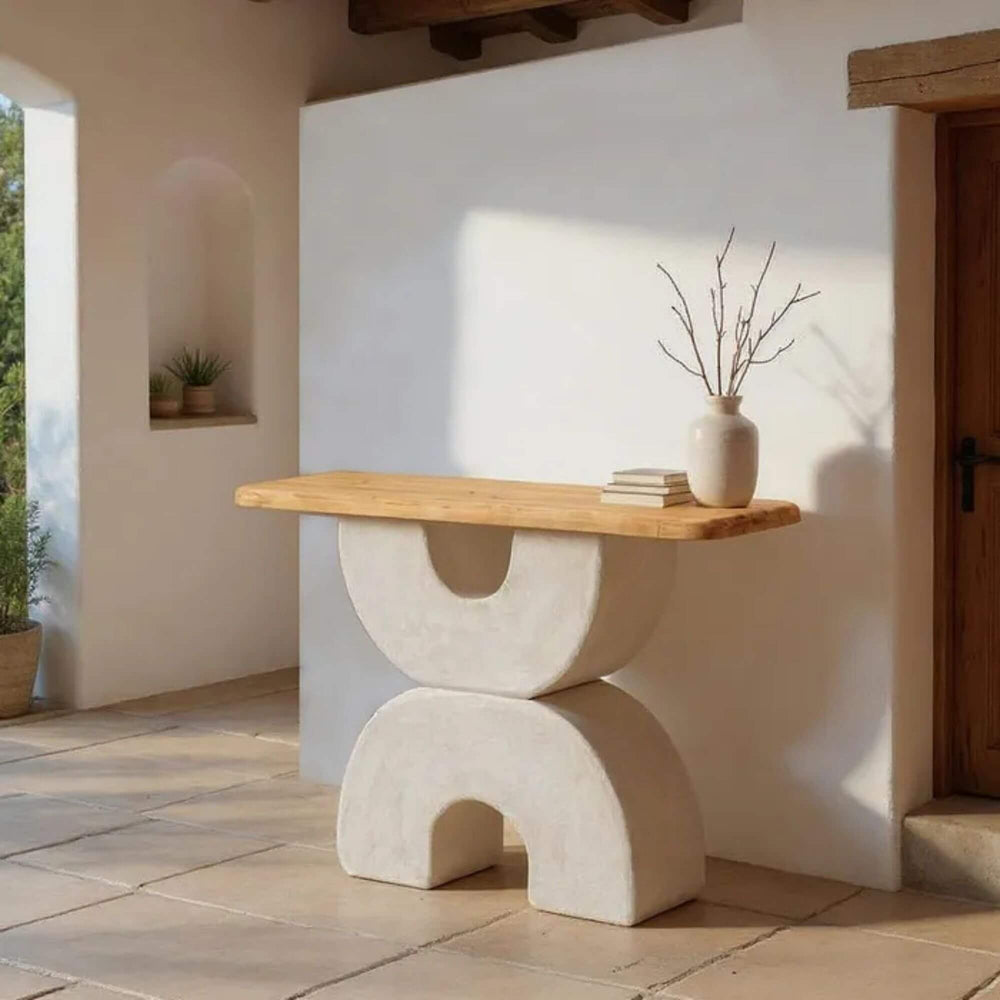 Console table styled in a Mediterranean-inspired interior with natural light.