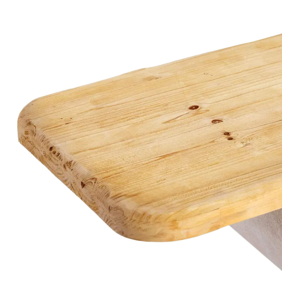 Detail of the natural wood top showing grain and handcrafted finish.