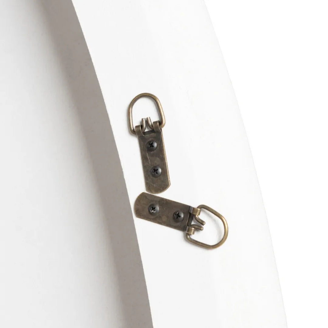 Rear view of the Dune mirror showing wall mounting hardware.
