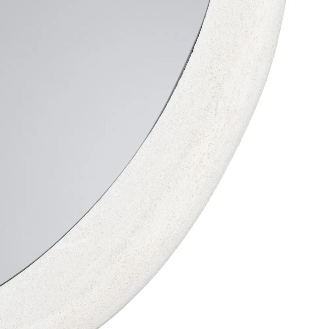 Close-up detail of the Dune mirror frame highlighting the textured painted finish.