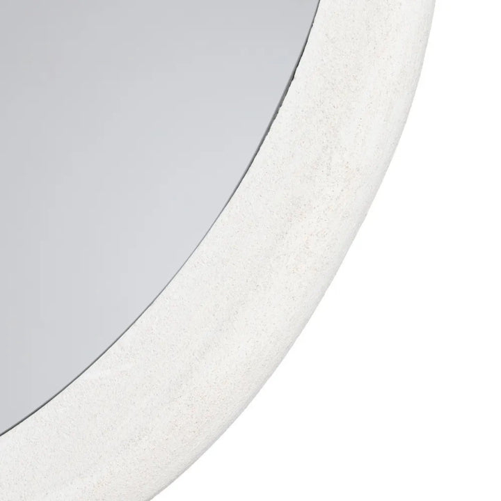 Close-up detail of the Dune mirror frame highlighting the textured painted finish.