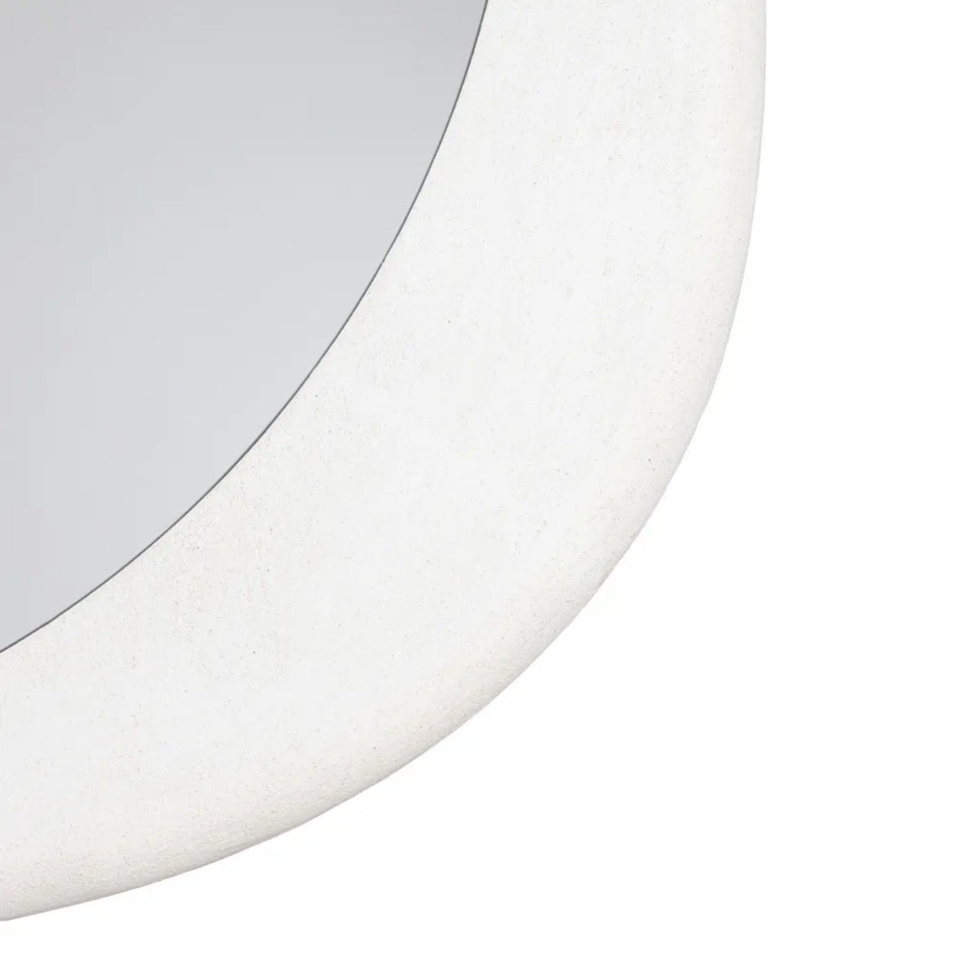 Close-up detail of the Dune mirror frame highlighting the textured painted finish.