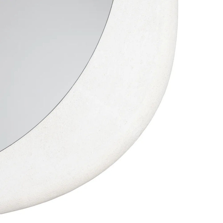 Close-up detail of the Dune mirror frame highlighting the textured painted finish.