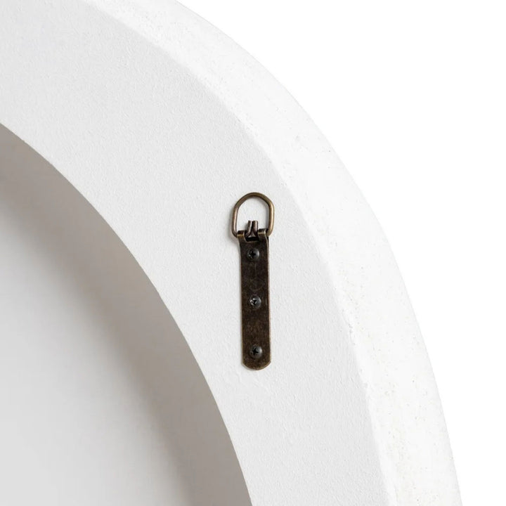 Rear view of the Dune mirror showing wall mounting hardware.