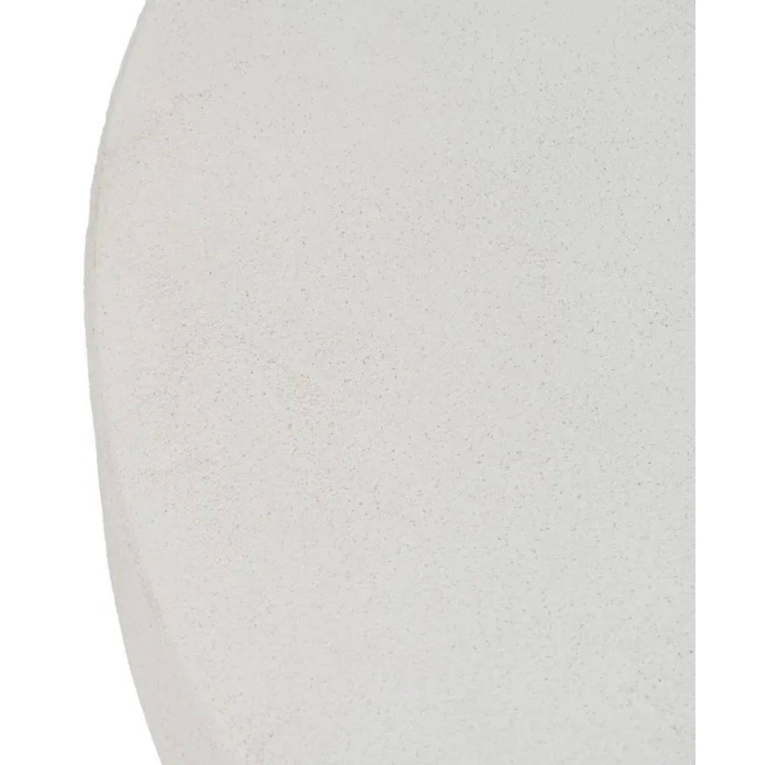 Close-up Modern round coffee table in off-white wood, minimalist design top