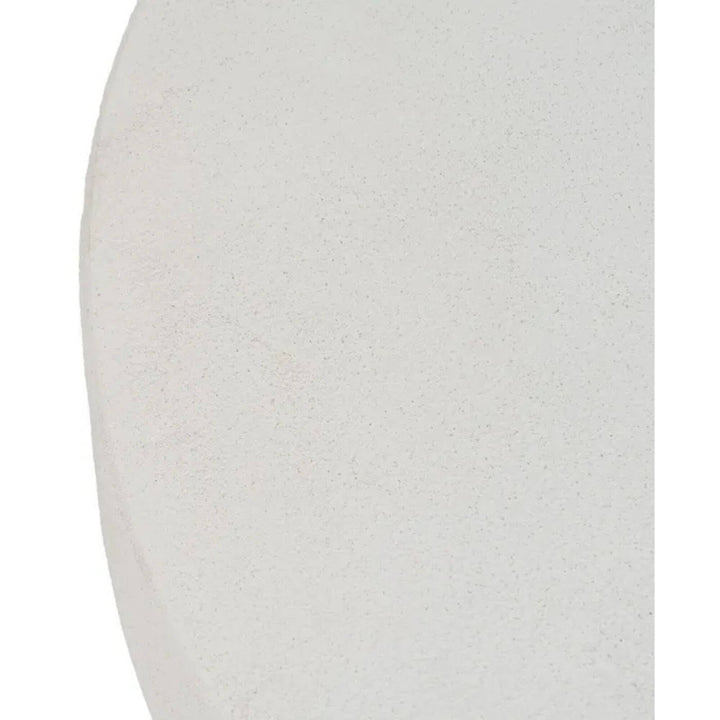 Close-up Modern round coffee table in off-white wood, minimalist design top