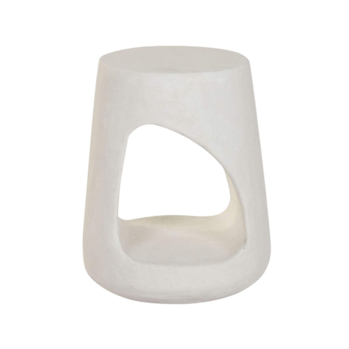 Front view of the Dune Stool featuring its sculptural opening and matte white finish.