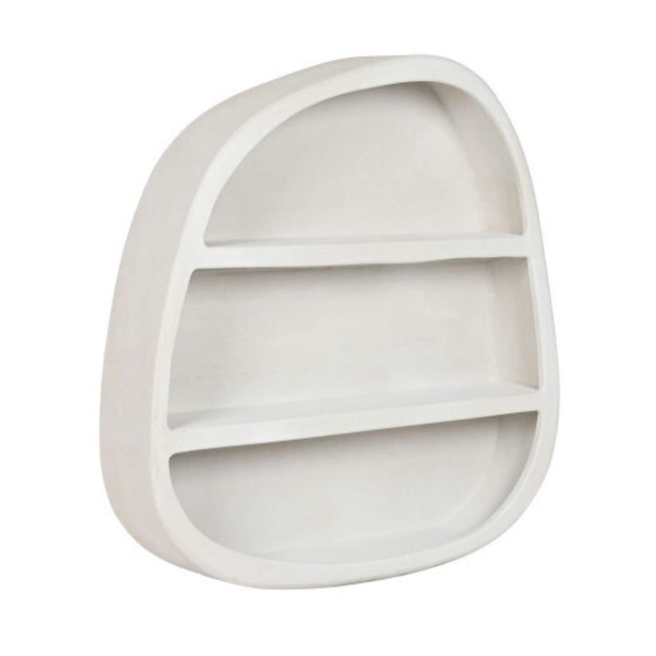 Angled view of organic-shaped white wall shelf with three tiers