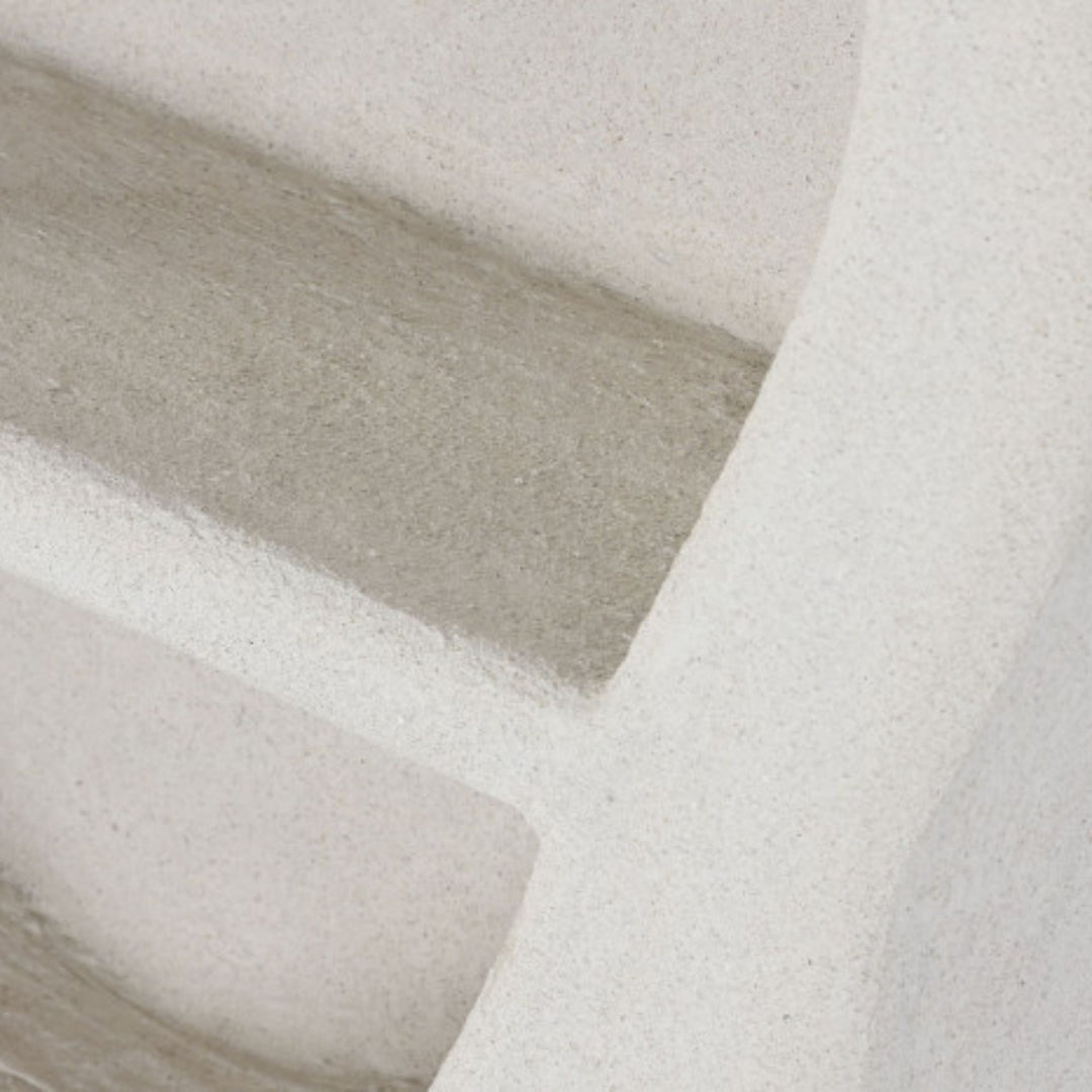 Detail view of the shelf edge emphasizing the soft curves and material texture.