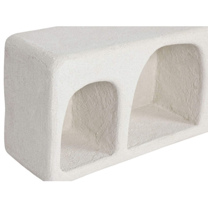 Close-up Minimalist wall-mounted shelf with multiple niches in neutral tone