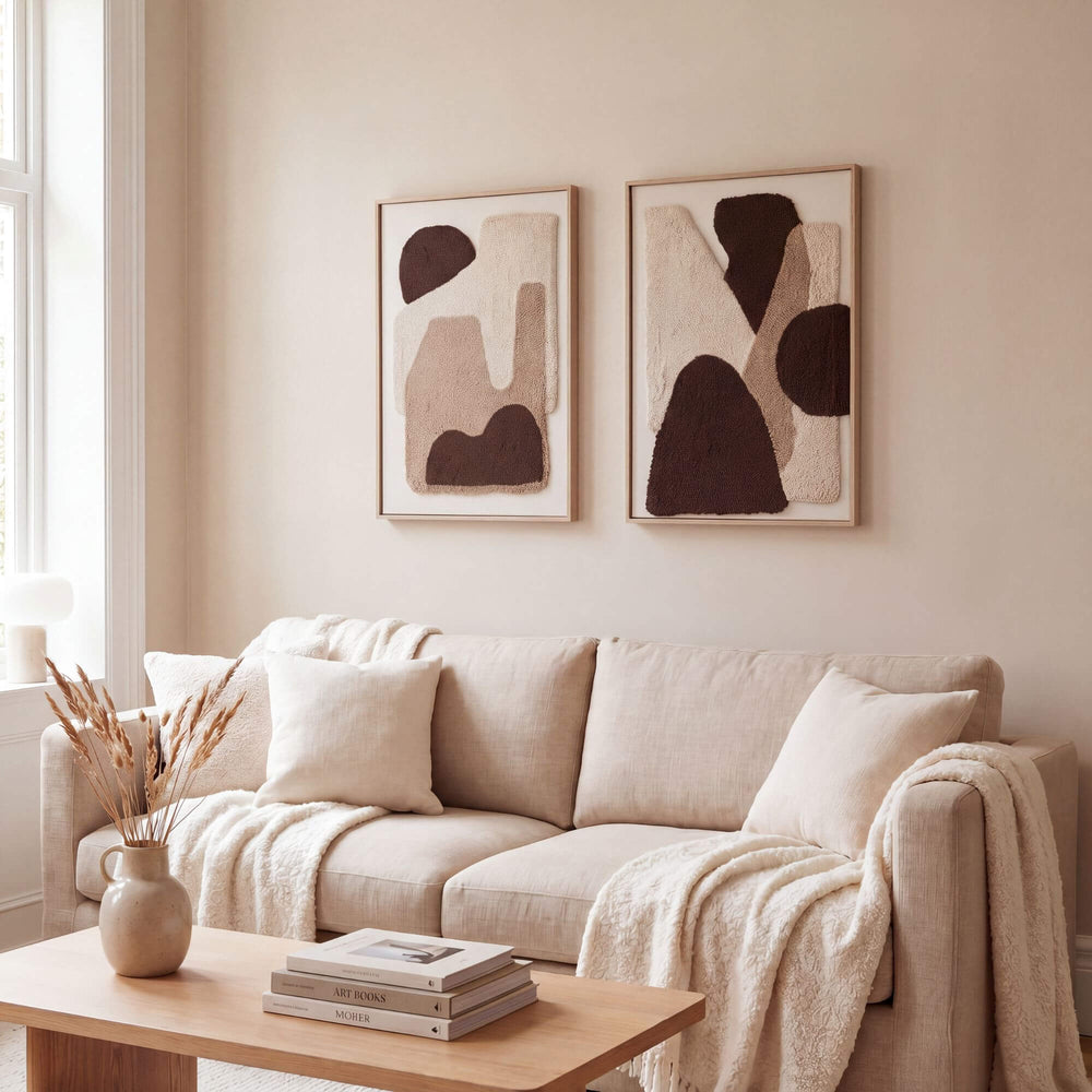 Styled living room setting featuring the Earth Forms artwork displayed above a sofa in a warm natural interior.