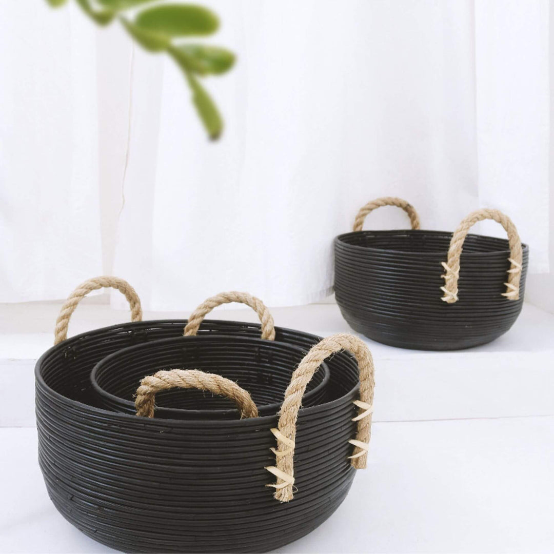 Pair of Ebony baskets styled as decorative storage in a living room