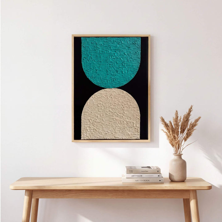 Eclipse painting by Manuel Pereyra displayed above a console table in a warm contemporary interior