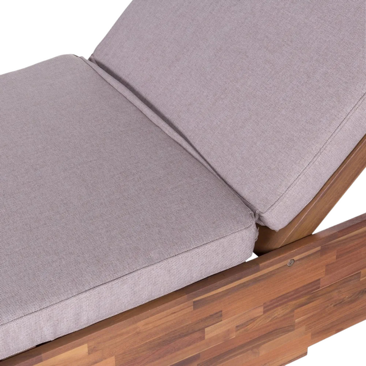 Close-up detail of the cushioned backrest and fabric texture on the Eden sunbed.