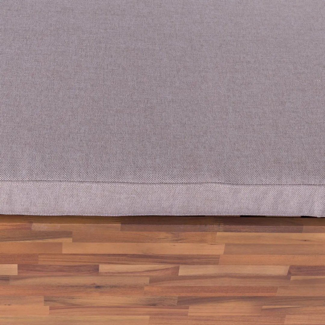 Close-up detail of the cushioned backrest and fabric texture on the Eden sunbed.