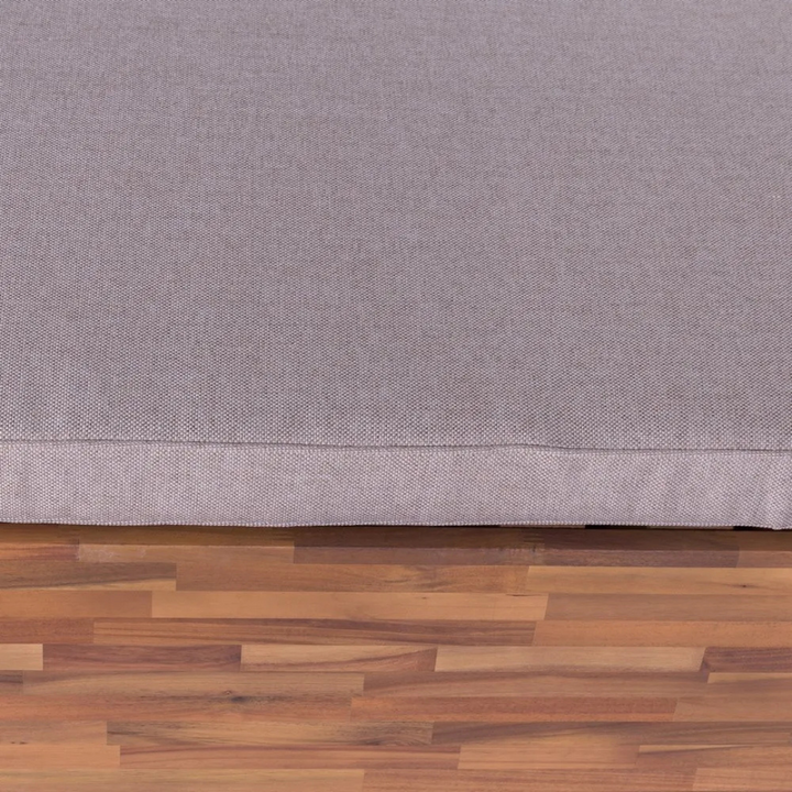 Close-up detail of the cushioned backrest and fabric texture on the Eden sunbed.