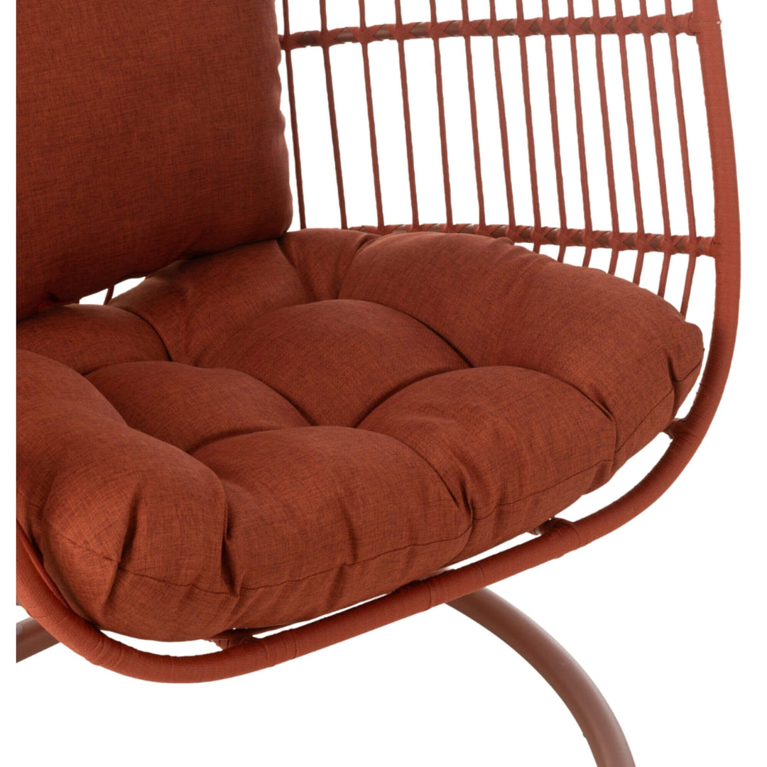 Cushioned seat detail of terracotta hanging chair