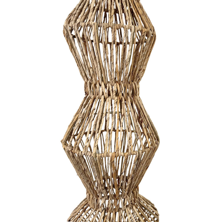 Handwoven decorative floor lamp with geometric design