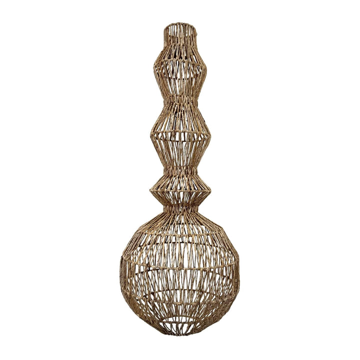 Full view of tall organic-style floor and ceiling lamp