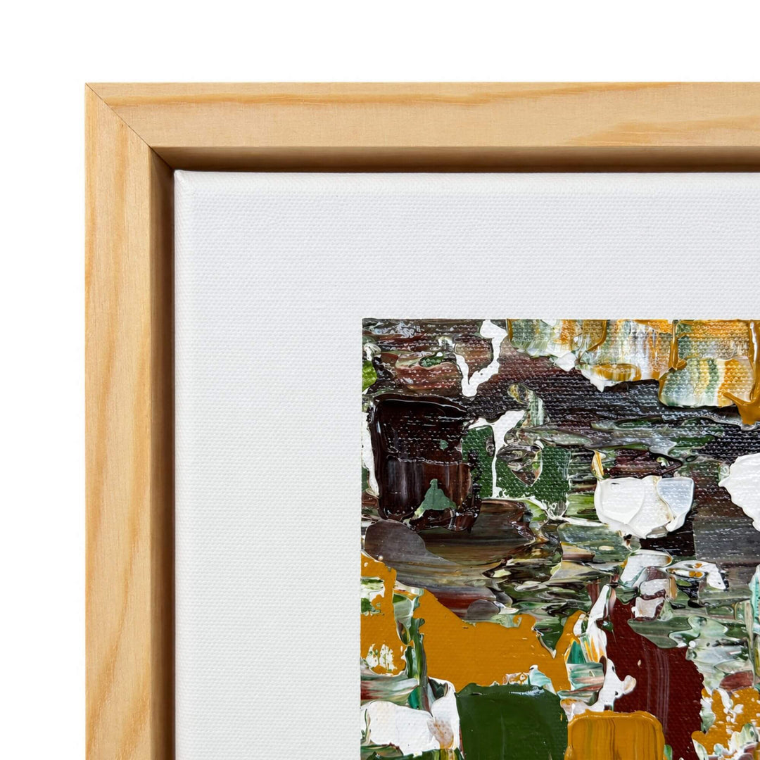 1. Close-up of the Emerald Terrain painting highlighting the layered emerald green, ochre, white, and dark abstract brushwork