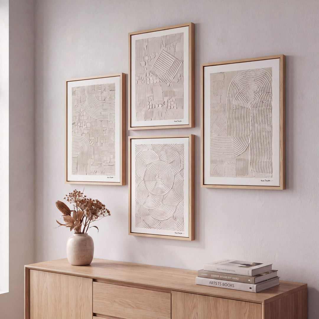 Woven Earth paintings by Manuel Pereyra displayed as a gallery wall above a natural wood sideboard