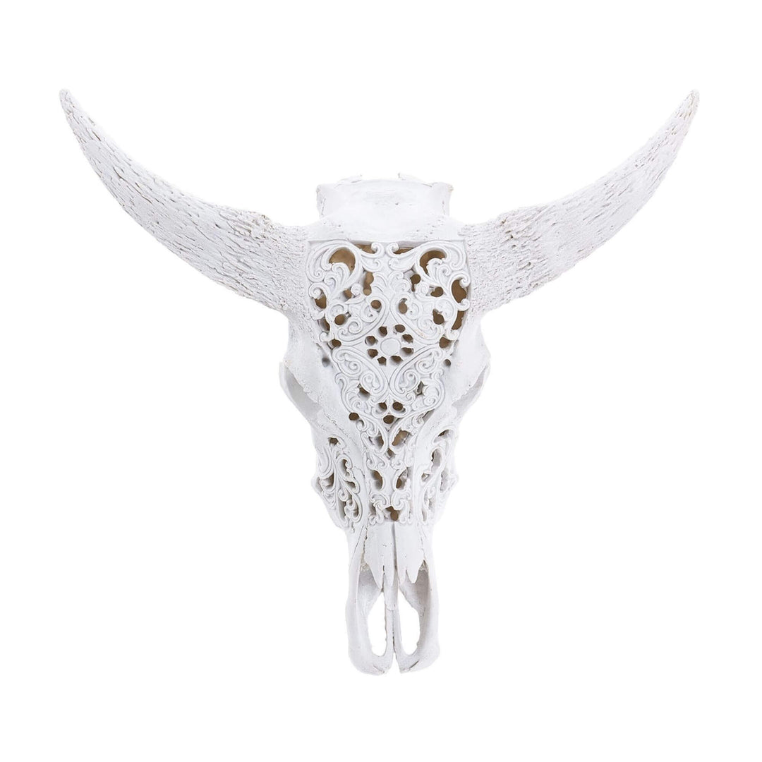 White polyresin bull head wall decor "L" with intricate ethnic carvings.