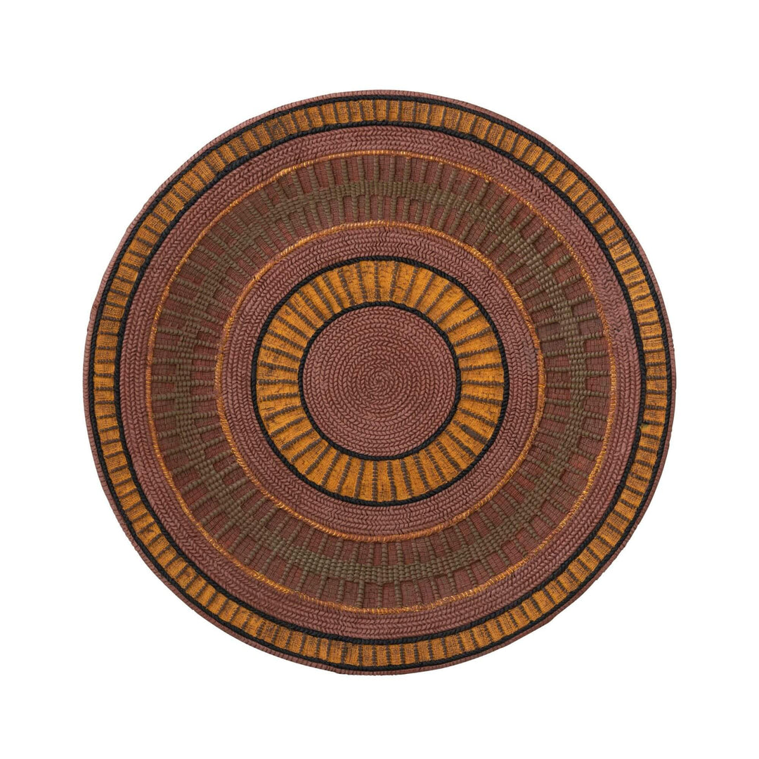 Large circular ethnic platter in earthy tones for home decor