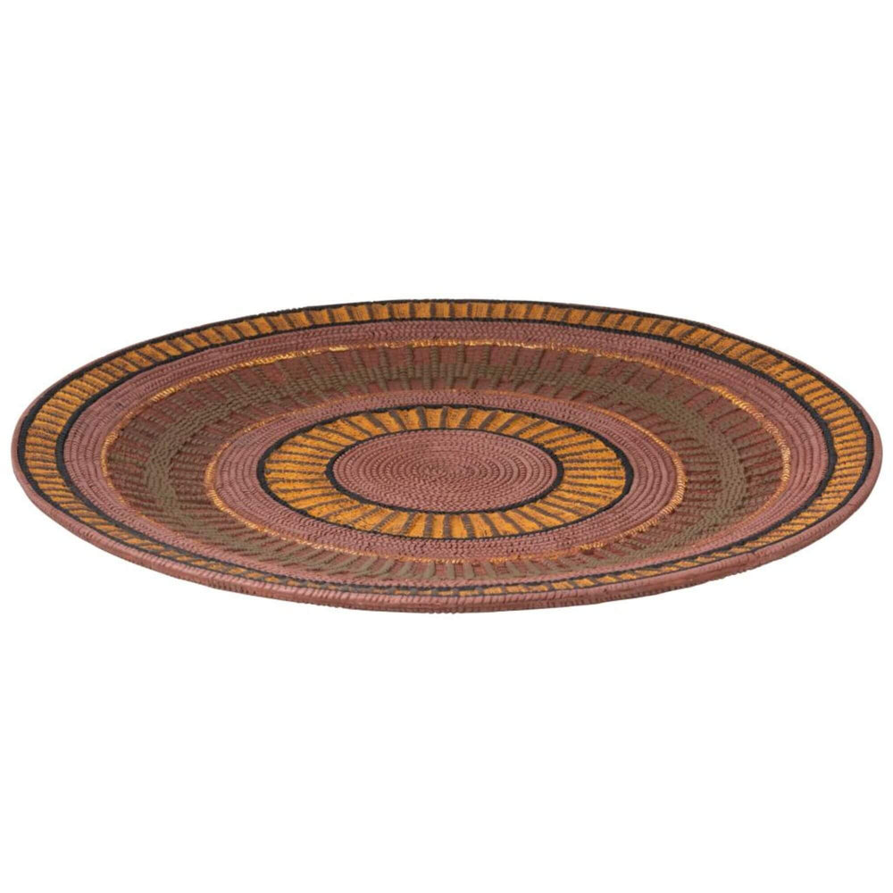 Round ethnic platter with multicolor concentric patterns