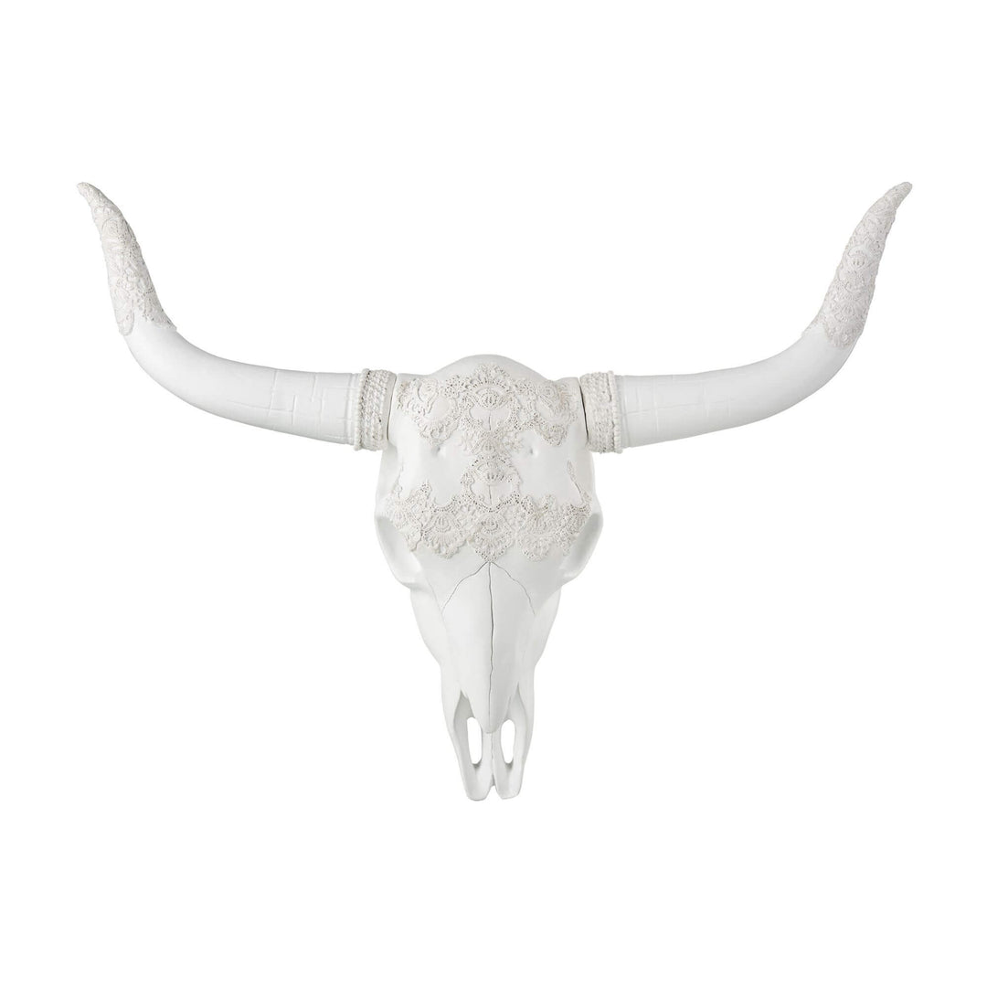 Ethnic White Skull wall decor with intricate carved patterns in white polyresin.