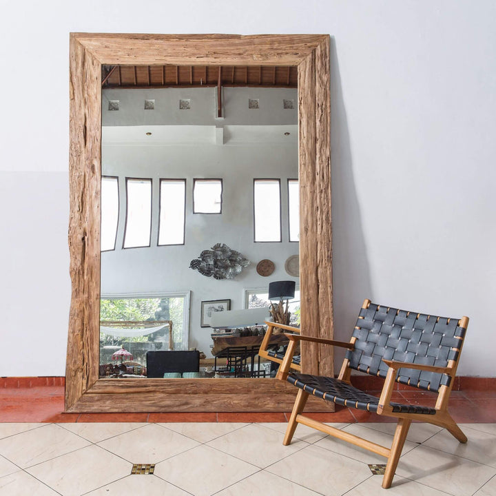 Full-length reclaimed teak mirror in a living room setting.