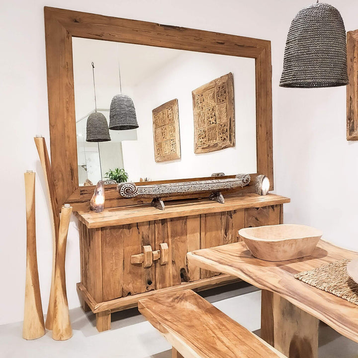 Full-length reclaimed teak mirror in a living room setting.