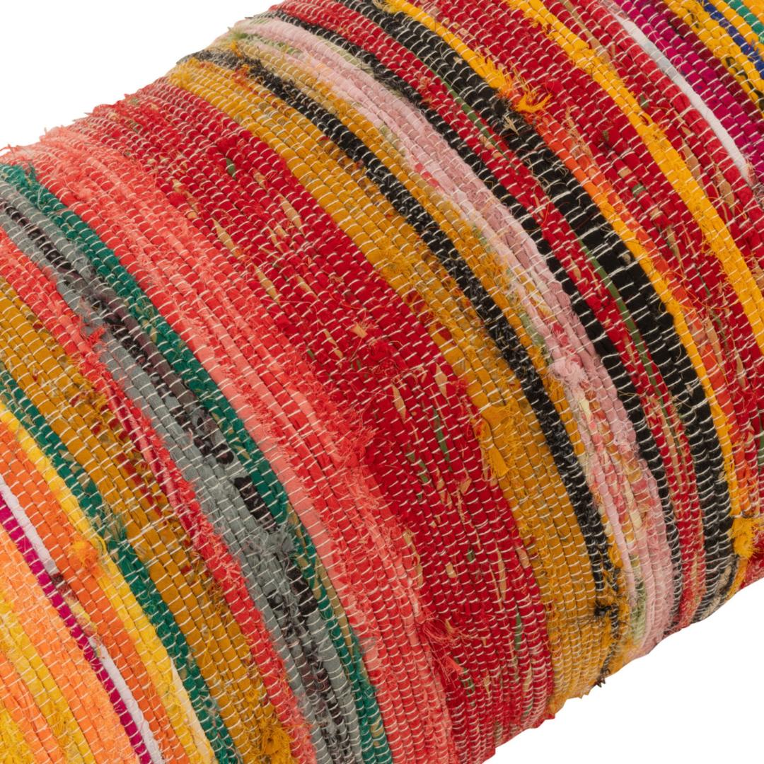 Close-up of Farsha chindi bolster cushion showing colourful chindi weave texture