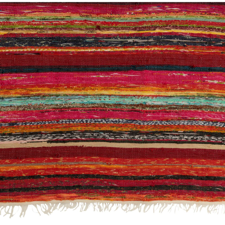 Close-up view of chindi plaid showing multicolor striped weave and fringe detail