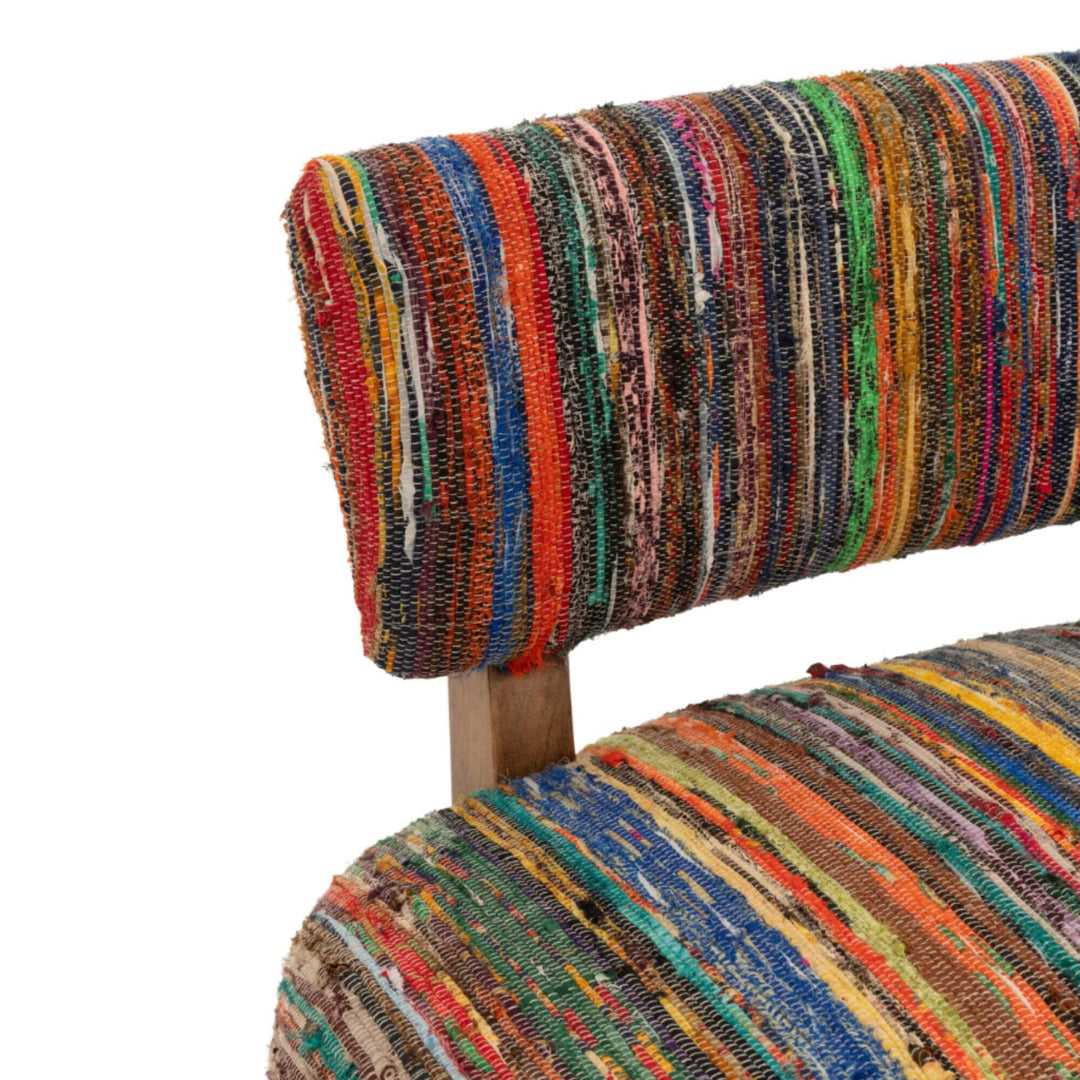 Detail shot of the bright recycled chindi fabric with colorful threads.