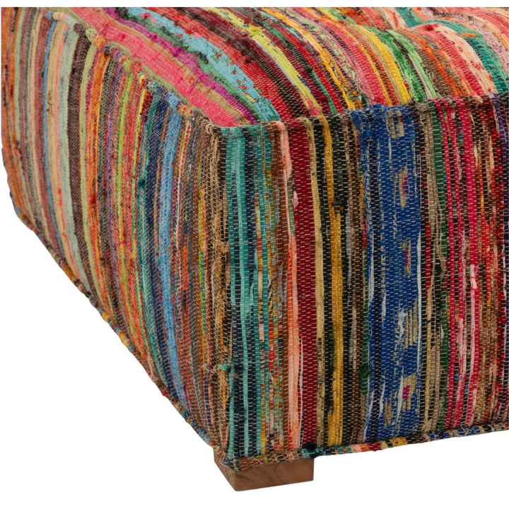 Detailed corner view of square pouf showing wooden feet and woven texture